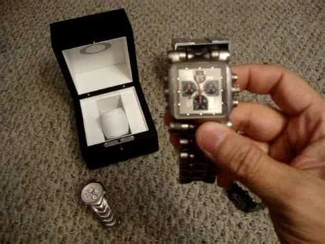 how to spot a fake oakley minute machine watch